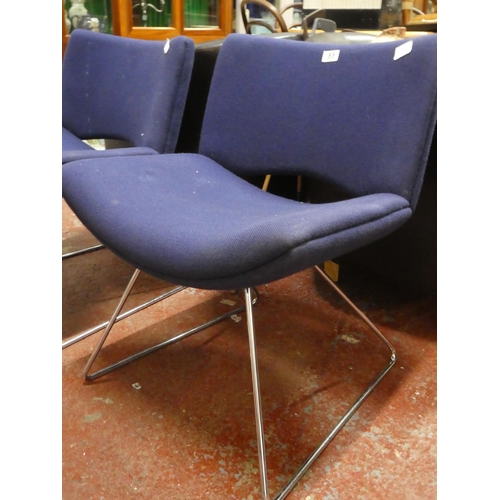 85 - A pair of vintage upholstered chairs.