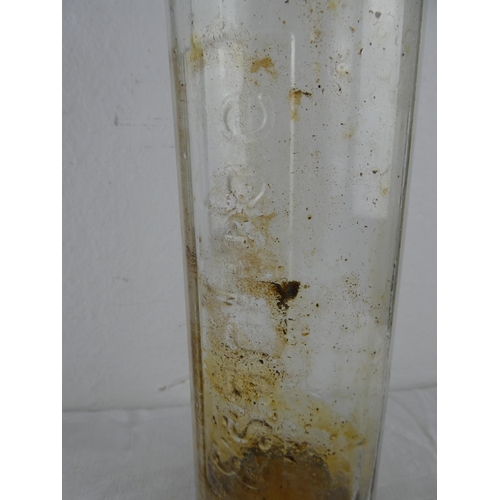 94 - A vintage Essolube glass bottle.