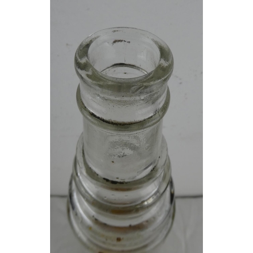 94 - A vintage Essolube glass bottle.