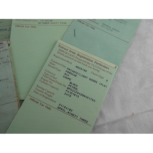 95 - A large collection of vintage car registration books.