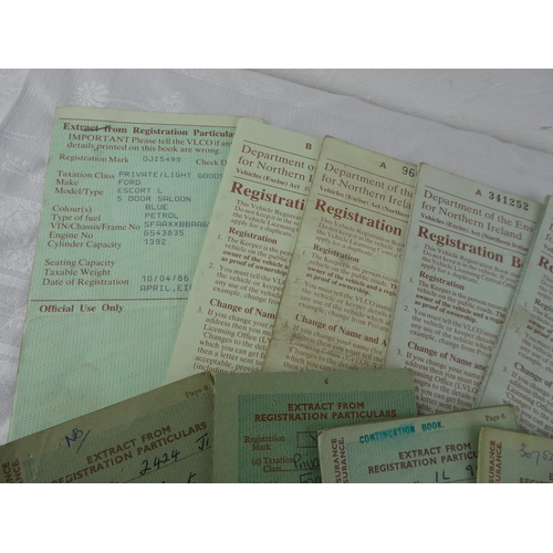 95 - A large collection of vintage car registration books.