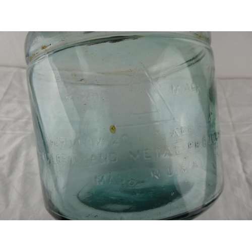 96 - A vintage glass jar 'The Cleveland Metal Products Co, USA'.