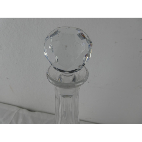 98 - A glass decanter and stopper.