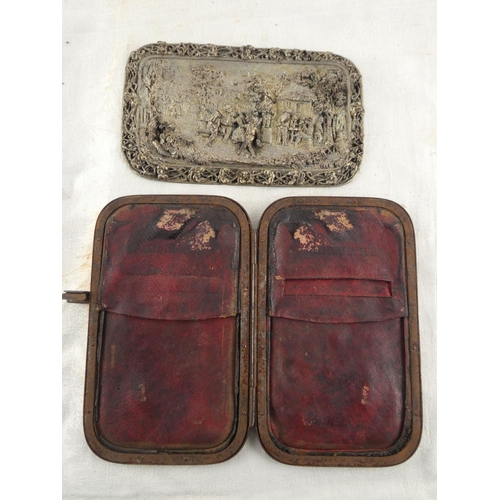 162 - A stunning antique leather purse with decorative metal cover, in need of some restoration.
