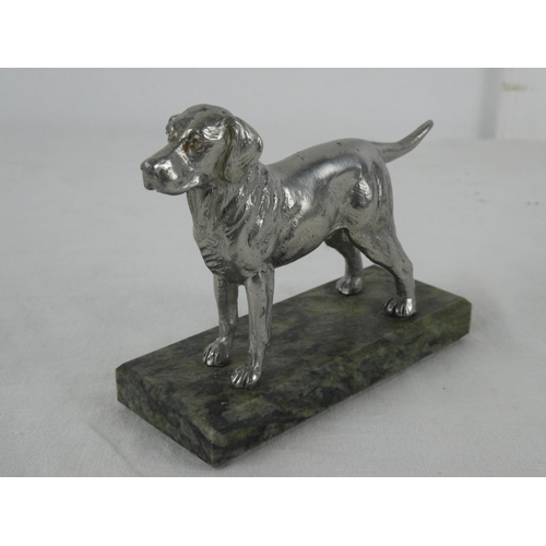 12 - A metal figurine of a Labrador dog on a Connemara marble base.