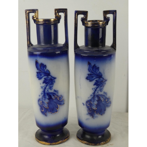 14 - A stunning pair of antique vases measuring 42cm.