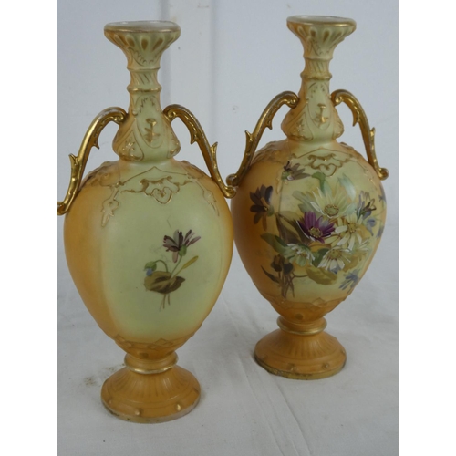 26 - A stunning pair of Austrian vases with gilt detail measuring 27cm high.