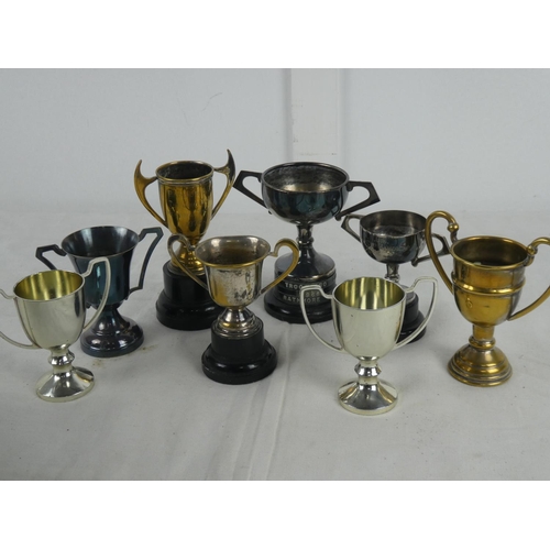 50 - A collection of small presentation cups to include Rathmore Golf Club.