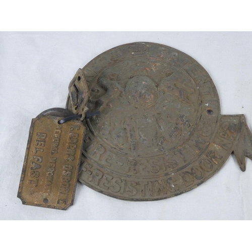 58 - An assortment of metal plaques, including T Edens Osborne, General Merchants, Belfast.
