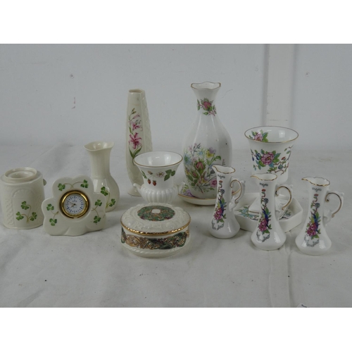 59 - A large collection of ceramics to include Aynsley, Donegal China, Wedgwood and more.