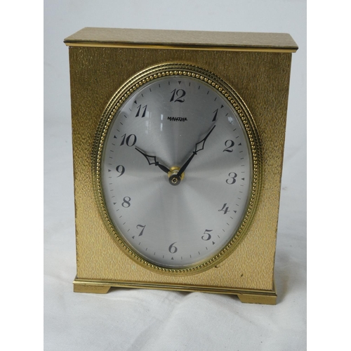 66 - A vintage metal cased 'Mauthe' mantle clock.