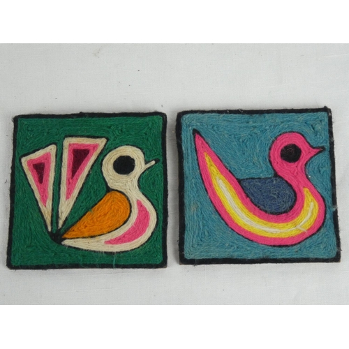 67 - Two small handcrafted wall plaques of birds.