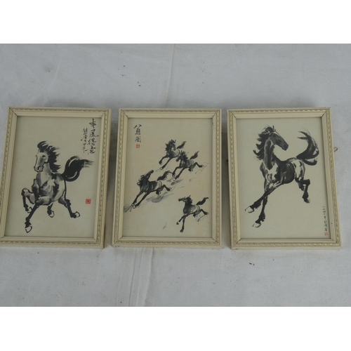 79 - A set of three small framed prints of horses.