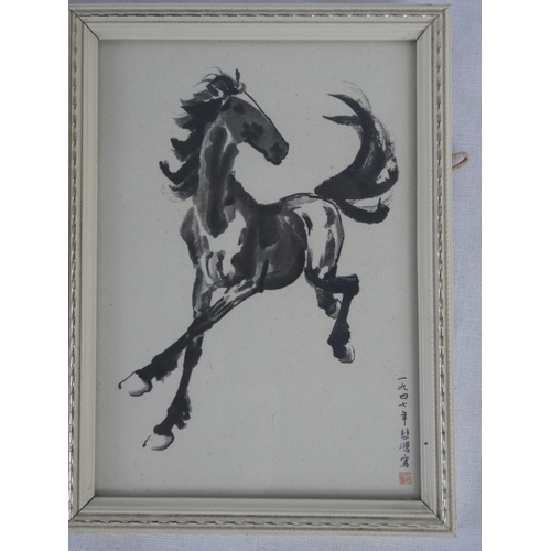 79 - A set of three small framed prints of horses.