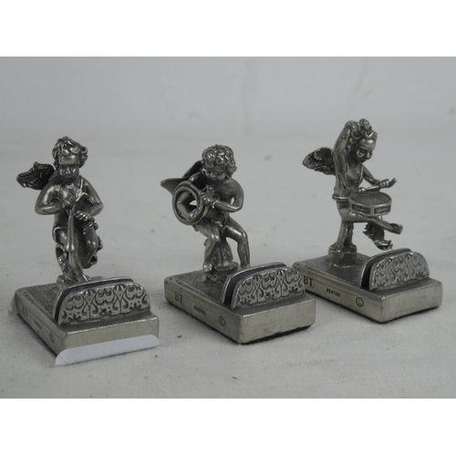 84 - A set of three pewter name place holders.