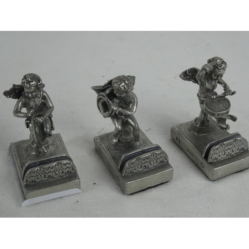 84 - A set of three pewter name place holders.