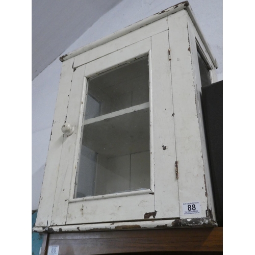 88 - An antique pine meat safe with glass panel door.