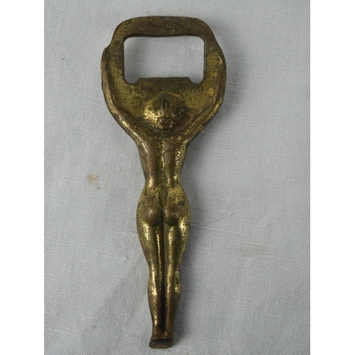 21 - A vintage novelty brass bottle opener.