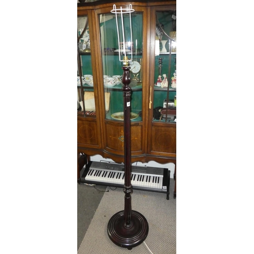 457 - A mahogany standard lamp base.