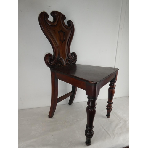 459 - A stunning antique shield back chair.