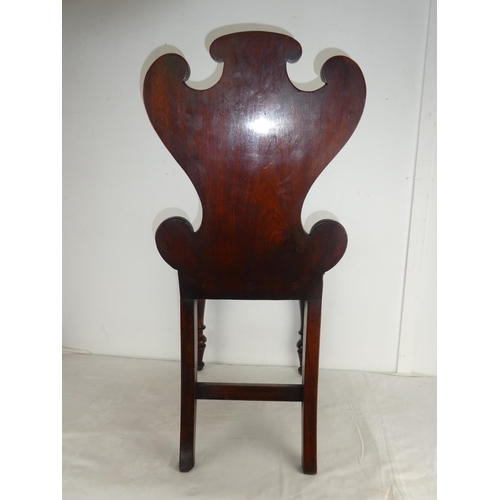 459 - A stunning antique shield back chair.