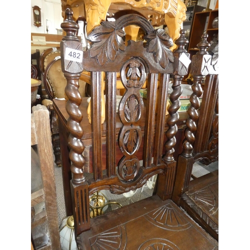 482 - A stunning pair of antique oak hall chairs with barley twist legs.