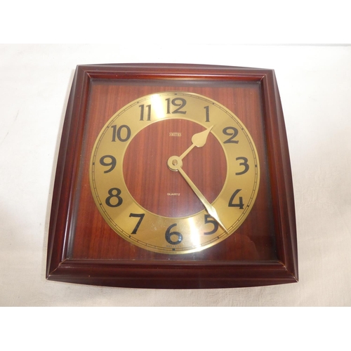 496 - A vintage Smiths Quartz wall clock.