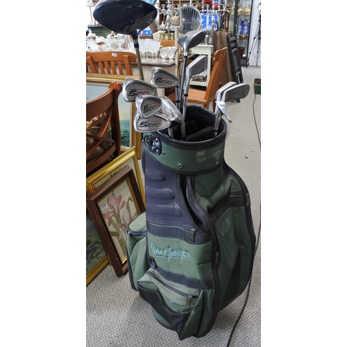 509 - A set of golf clubs to include a King Cobra 12 diver and MG No 5 driver also MG 500 irons number 3, ... 