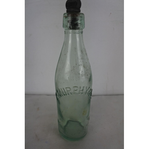 530 - A P Murphy & Co, Ballymena glass bottle and original stopper.