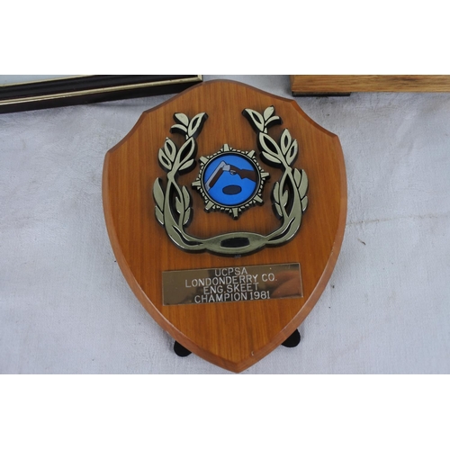 546 - A framed 'Police Athletic Association Champion' fabric badge and more.