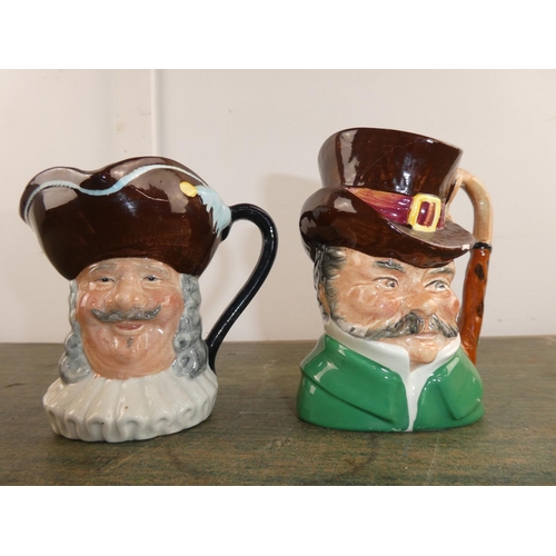 562 - Two Righton Studies mask jugs, London Cabby 1850 and another.