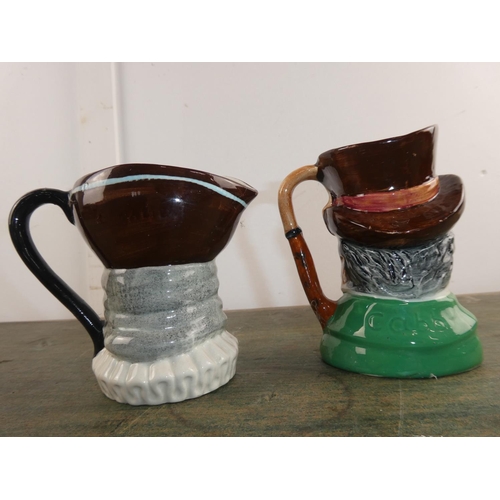 562 - Two Righton Studies mask jugs, London Cabby 1850 and another.