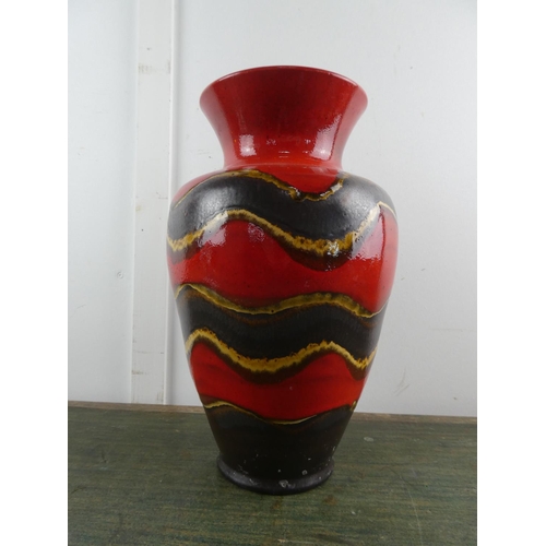 566 - A stunning German pottery vase.