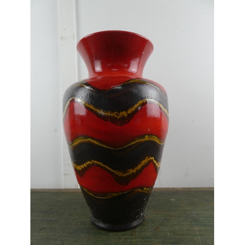 566 - A stunning German pottery vase.