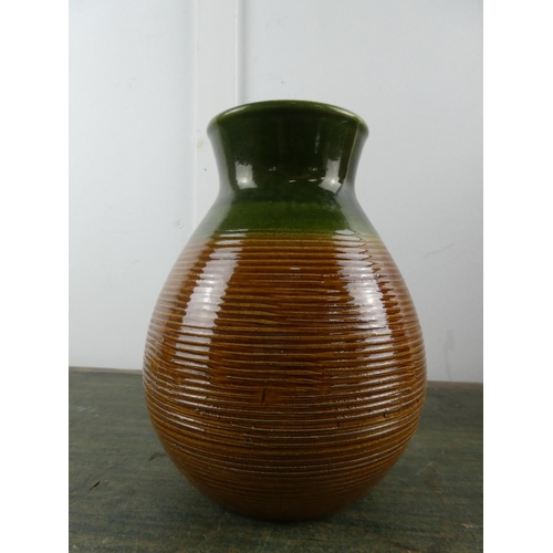 570 - A stunning German pottery ridged vase.