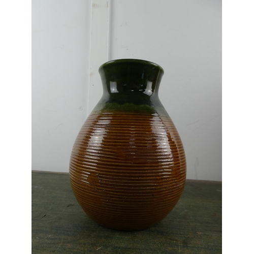 570 - A stunning German pottery ridged vase.