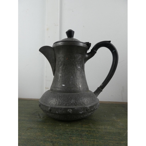 577 - An antique pewter coffee pot.