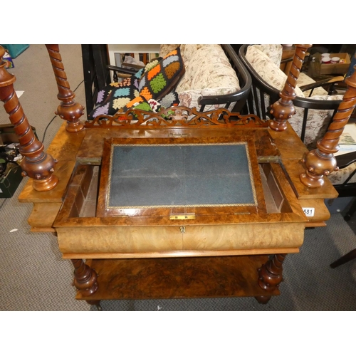 581 - A stunning antique walnut whatnot with hidden writing slope.