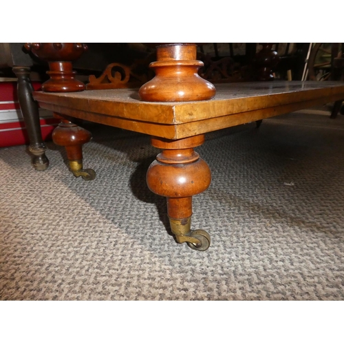 581 - A stunning antique walnut whatnot with hidden writing slope.