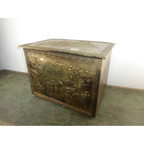 583 - A brass coal box with embossed detail of Ann Hathaways Cottage.