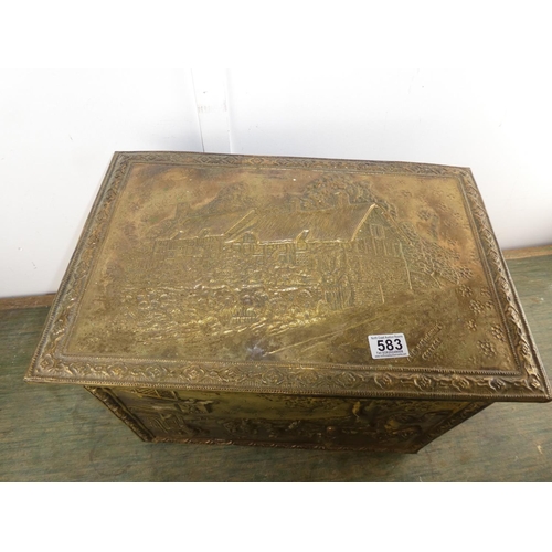 583 - A brass coal box with embossed detail of Ann Hathaways Cottage.