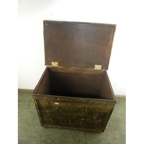 583 - A brass coal box with embossed detail of Ann Hathaways Cottage.