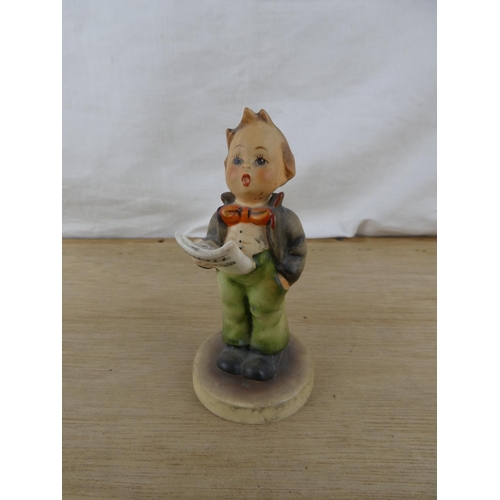 102 - A Goebel Hummel figurine, 'Sololist'.