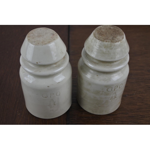 20 - A pair of vintage GPO porcelain insulators.