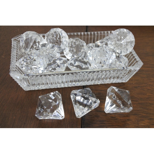 23 - A crystal dish and contents.