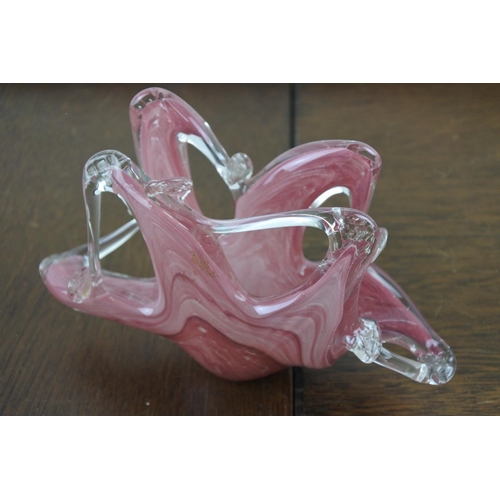 38 - A decorative pink glass basket.