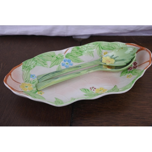 43 - A stunning decorative salad plate and tongs.