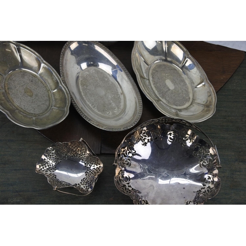 45 - An assortment of silver plated ware.