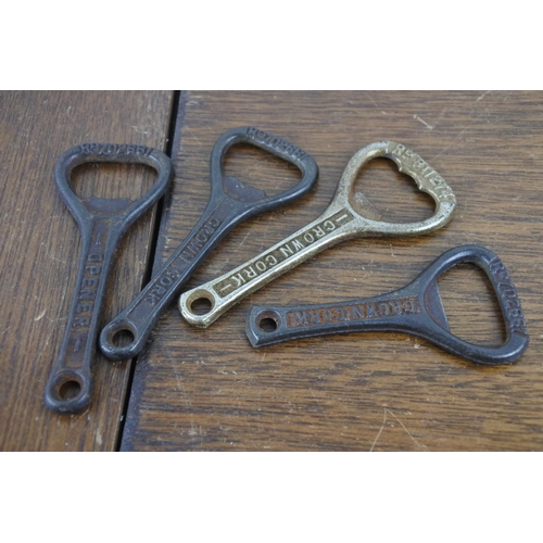 57 - A collection of four vintage Crown Cork bottle openers.