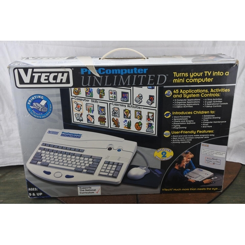 63 - A vintage boxed Vtech ProComputer Unlimited console.